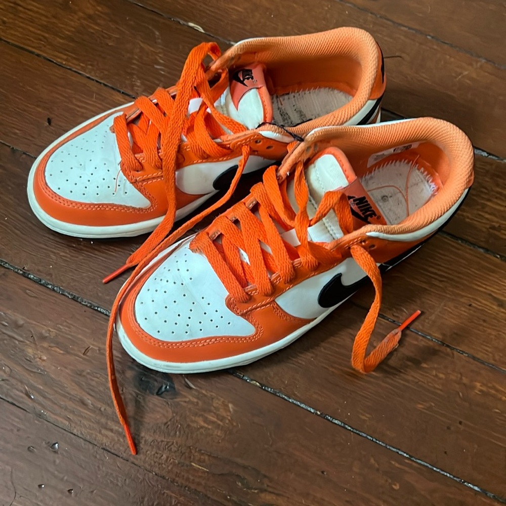 Orange, white and black dunks kids size 4